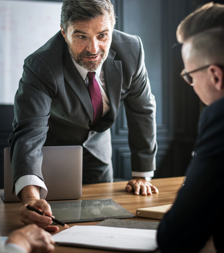 Attorney discussing a legal matter with a client at a conference table
